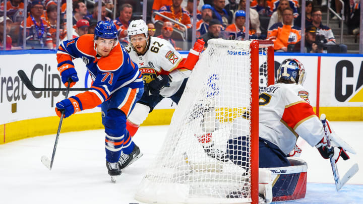 Jun 21, 2024; Edmonton, Alberta, CAN; Edmonton Oilers center Ryan McLeod (71) passes the puck against the Florida Panthers during the second period in game six of the 2024 Stanley Cup Final at Rogers Place. Mandatory Credit: Sergei Belski-USA TODAY Sports