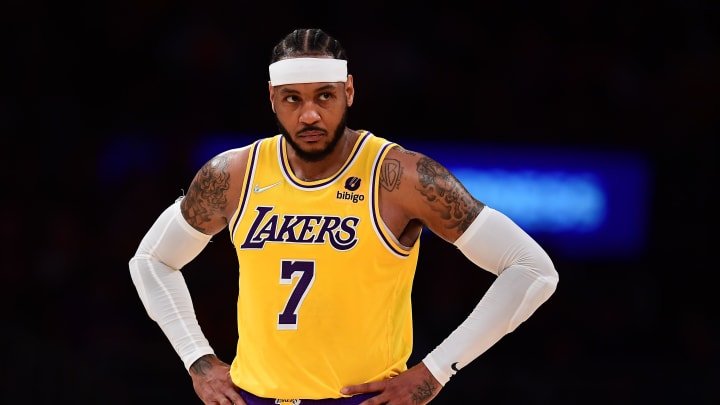 Nov 8, 2021; Los Angeles, California, USA; Los Angeles Lakers forward Carmelo Anthony (7) reacts against the Charlotte Hornets during the second half at Staples Center. Mandatory Credit: Gary A. Vasquez-USA TODAY Sports