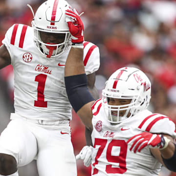 Sep 1, 2018; Houston, TX, USA; Mississippi Rebels wide receiver A.J. Brown (1) and offensive lineman Javon Patterson (79) celebrate after a touchdown during the fourth quarter against the Texas Tech Red Raiders at NRG Stadium. Mandatory Credit: Troy Taormina-Imagn Images