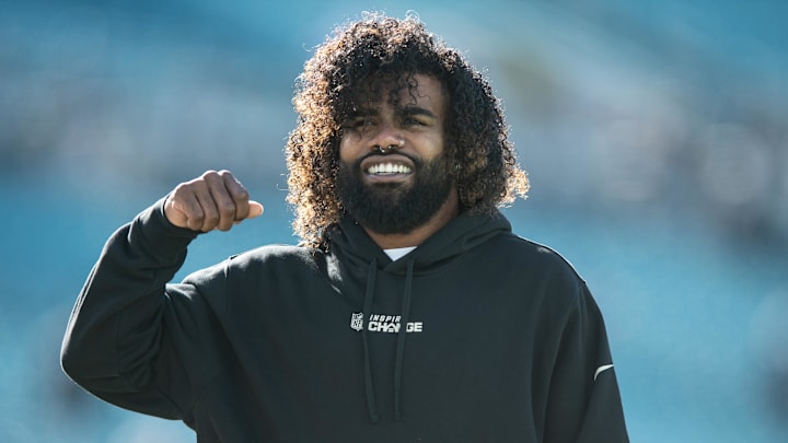 Dec 18, 2022; Jacksonville, Florida, USA; Dallas Cowboys running back Ezekiel Elliot (21) warms up before the game against the Jacksonville Jaguars at TIAA Bank Field. Mandatory Credit: Jeremy Reper-Imagn Images
