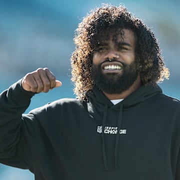 Dec 18, 2022; Jacksonville, Florida, USA; Dallas Cowboys running back Ezekiel Elliot (21) warms up before the game against the Jacksonville Jaguars at TIAA Bank Field. Mandatory Credit: Jeremy Reper-Imagn Images