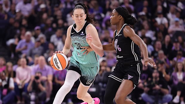 Liberty forward Breanna Stewart (30) drives in against Golden State Valkyries guard Kayla Charles