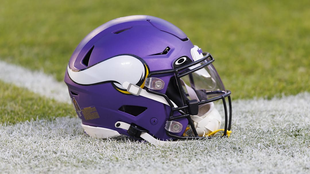 Jan 1, 2023; Green Bay, Wisconsin, USA;  A Minnesota Vikings helmet sits on the field during warmups prior to the game against the Green Bay Packers at Lambeau Field. Mandatory Credit: Jeff Hanisch-Imagn Images