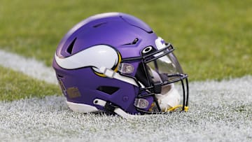 Jan 1, 2023; Green Bay, Wisconsin, USA;  A Minnesota Vikings helmet sits on the field during warmups prior to the game against the Green Bay Packers at Lambeau Field. Mandatory Credit: Jeff Hanisch-Imagn Images