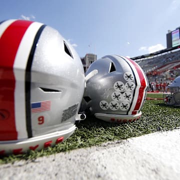 Sep 18, 2021; Columbus, Ohio, USA; Ohio State Buckeyes helmets before the game against the Tulsa Golden Hurricane at Ohio Stadium. Mandatory Credit: Joseph Maiorana-Imagn Images