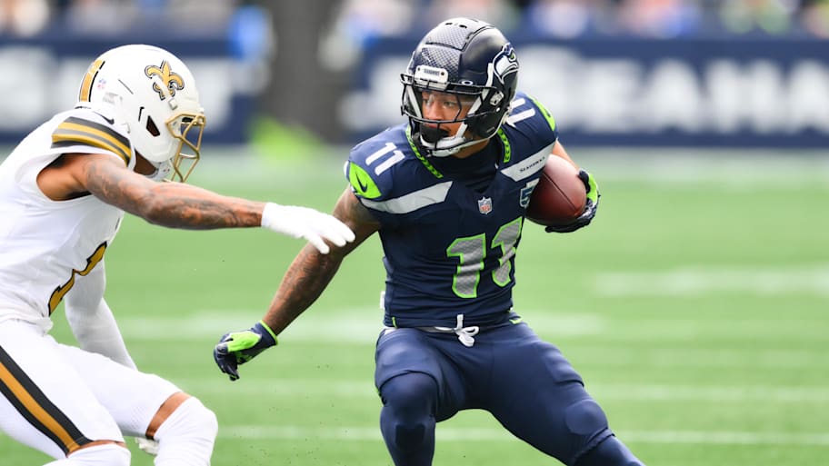 Seattle Seahawks wide receiver Jaxon Smith-Njigba (11) carries the ball after a catch against the New Orleans Saints