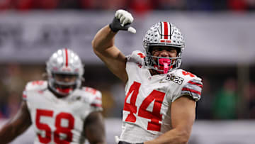 Jan 20, 2025; Atlanta, GA, USA; Ohio State Buckeyes defensive end JT Tuimoloau (44) reacts after a play against the Notre Dame Fighting Irish during the first half the CFP National Championship college football game at Mercedes-Benz Stadium. Mandatory Credit: Brett Davis-Imagn Images
