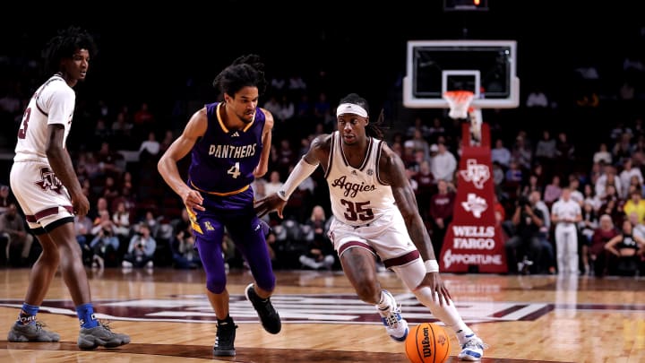 Dec 30, 2023; College Station, Texas, USA; Texas A&M Aggies guard Manny Obaseki (35) drives to the basket against Prairie View A&M Panthers guard Charles Smith IV (4) during the first half at Reed Arena. Mandatory Credit: Erik Williams-USA TODAY Sports
