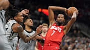Nov 7, 2025; San Antonio, Texas, USA;  Houston Rockets forward Kevin Durant (7) passes against San Antonio Spurs guard Stephon Castle (5) and guard Devin Vassell (24) during the second quarter at Frost Bank Center. Mandatory Credit: Dustin Safranek-Imagn Images