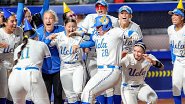 UCLA catcher Alexis Ramirez (28) runs home after hitting a home run in the fourth inning during a softball game between UCLA and Oregon at the Women’s College World Series at Devon Park in Oklahoma City, on Thursday, May 29, 2025.