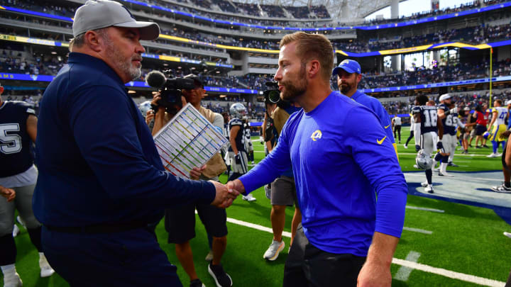 Aug 11, 2024; Inglewood, California, USA; Dallas Cowboys head coach Mike McCarthy meets with Los Angeles Rams head coach Sean McVay following the game at SoFi Stadium. 