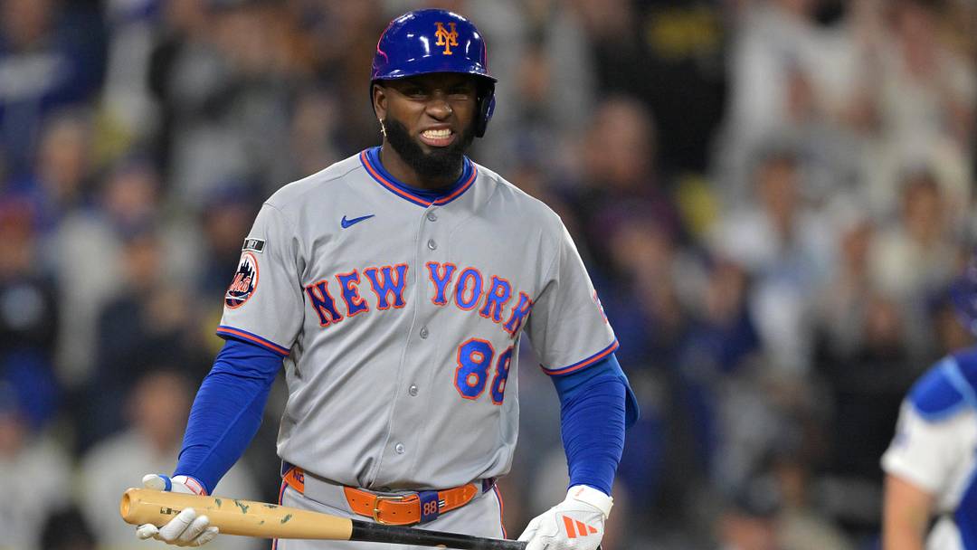 New York Mets center fielder Luis Robert Jr. (88) reacts after he was called out on strikes to end the eighth inning against the Los Angeles Dodgers at Dodger Stadium.