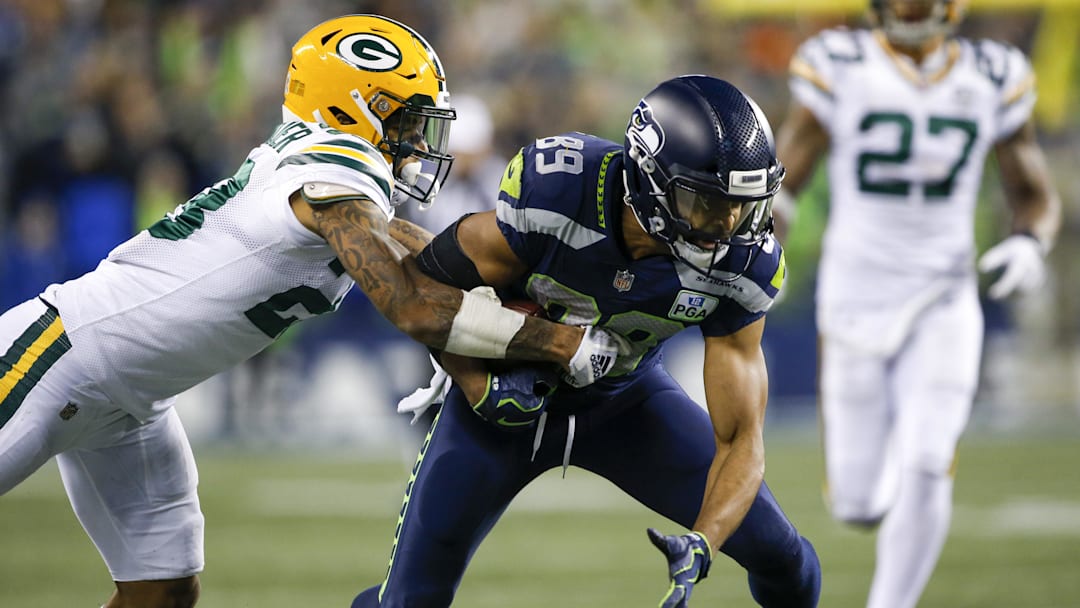 Green Bay Packers cornerback Jaire Alexander makes a tackle at the Seattle Seahawks in 2018.