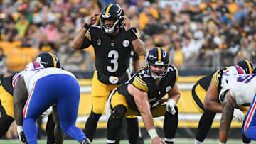 Pittsburgh Steelers quarterback Russell Wilson (3) calls out a coverage while waiting for center Zach Frazier (54) to snap the ball against the Buffalo Bills during the first quarter at Acrisure Stadium.