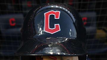 Oct 15, 2022; Cleveland, Ohio, USA; A Cleveland Guardians helmet and glove before game three of the NLDS for the 2022 MLB Playoffs at Progressive Field. Mandatory Credit: Ken Blaze-Imagn Images
