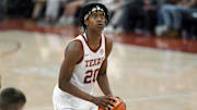 Nov 8, 2024; Austin, Texas, USA; Texas Longhorns guard Tre Johnson (20) shoots a free throw during the second half against the Houston Christian Huskies at Moody Center. Mandatory Credit: Scott Wachter-Imagn Images
