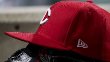 The hat and glove of Cincinnati Reds
