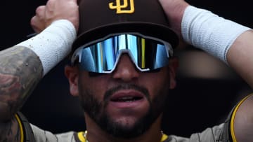 Aug 18, 2024; Denver, Colorado, USA; San Diego Padres outfielder David Peralta (24) gets ready to take the field for the ninth inning against the Colorado Rockies at Coors Field. Mandatory Credit: Christopher Hanewinckel-USA TODAY Sports