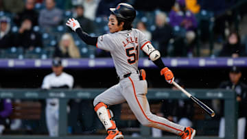 May 7, 2024; Denver, Colorado, USA; San Francisco Giants center fielder Jung Hoo Lee (51) hits a single in the fourth inning against the Colorado Rockies at Coors Field. 