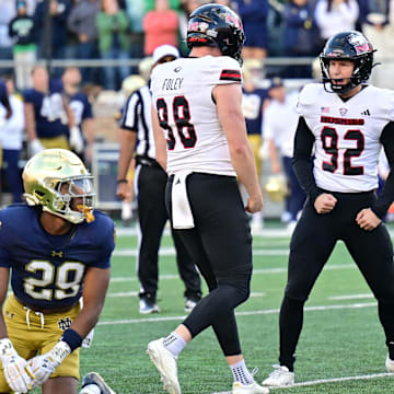 Northern Illinois Huskies kicker Kanon Woodill kicks the game winning field goal in the fourth quarter against the Notre Dame Fighting Irish.