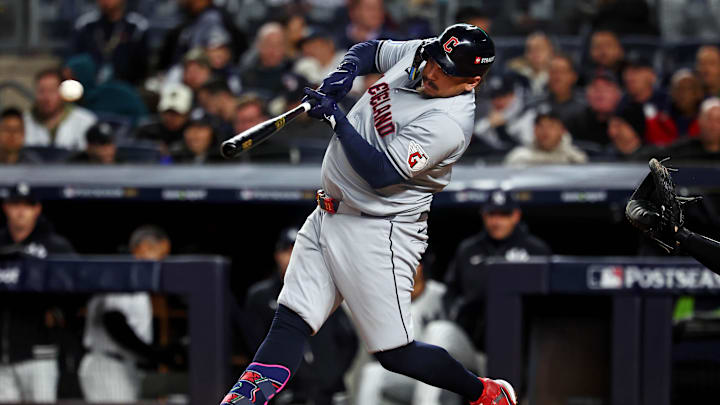 Oct 15, 2024; Bronx, New York, USA; Cleveland Guardians first base Josh Naylor (22) hits a single during the second inning against the New York Yankees in game two of the ALCS for the 2024 MLB Playoffs at Yankee Stadium. Mandatory Credit: Vincent Carchietta-Imagn Images Oct 15, 2024; Bronx, New York, USA; Cleveland Guardians first base Josh Naylor (22) hits a single during the second inning against the New York Yankees in game two of the ALCS for the 2024 MLB Playoffs at Yankee Stadium. Mandatory Credit: Vincent Carchietta-Imagn Images