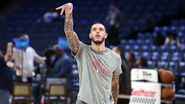 Oct 28, 2024; Memphis, Tennessee, USA; Chicago Bulls guard Lonzo Ball (2) holds after a shot during warm ups prior to the game against the Memphis Grizzlies at FedExForum. Mandatory Credit: Petre Thomas-Imagn Images