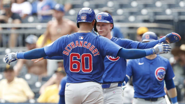 Aug 28, 2024; Pittsburgh, Pennsylvania, USA;  Chicago Cubs center fielder Pete Crow-Armstrong (rear) greets catcher Christian Bethancourt (60) crossing home plate on a two run home run against the Pittsburgh Pirates during the seventh inning at PNC Park.