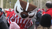 Bucky Badger mingles with fans who gather outside Whittemore Center Arena in Durham, New Hampshire, to welcome the Wisconsin women's hockey team before its NCAA national semifinal against Colgate at on Friday March, 22, 2024.