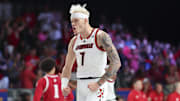 Nov 27, 2024; Paradise Island, Bahamas, BHS; Louisville Cardinals forward Kasean Pryor (7) reacts after dunking  during the second half against the Indiana Hoosiers at the Atlantis Resort.  Mandatory Credit: Kevin Jairaj-Imagn Images
