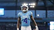 Kansas Jayhawks running back Devin Neal (4) looks back after a touchdown against Lindenwood Lions in the second quarter Thursday, August 29, 2024 at Children's Mercy Park.
