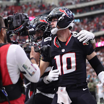 Nov 9, 2025; Houston, Texas, USA; Houston Texans quarterback Davis Mills (10) reacts after scoring a touchdown against the Jacksonville Jaguars during the second half at NRG Stadium. Mandatory Credit: Troy Taormina-Imagn Images