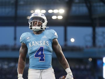 Kansas Jayhawks running back Devin Neal (4) looks back after a touchdown against Lindenwood Lions in the second quarter Thursday, August 29, 2024 at Children's Mercy Park.