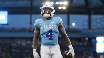 Kansas Jayhawks running back Devin Neal (4) looks back after a touchdown against Lindenwood Lions in the second quarter Thursday, August 29, 2024 at Children's Mercy Park.