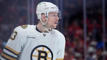Boston Bruins center Charlie Coyle (13) prepares for a face-off against the Washington Capitals during the first period at Capital One Arena. 