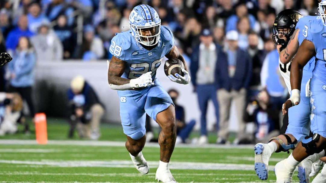 Nov 16, 2024; Chapel Hill, North Carolina, USA;  North Carolina Tar Heels running back Omarion Hampton (28) runs in a game.