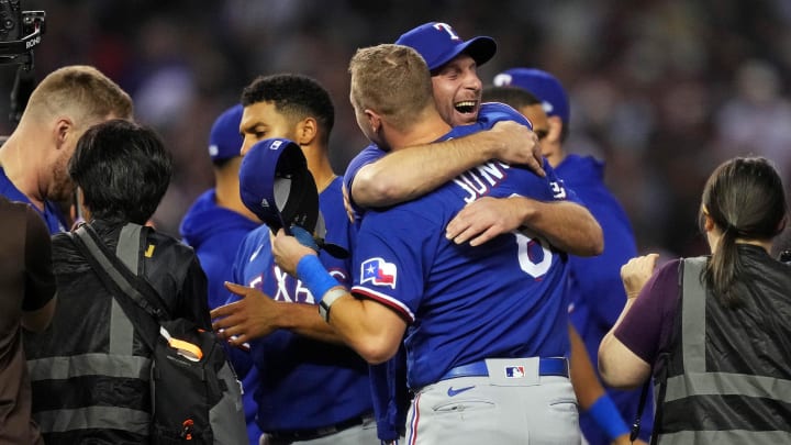 Texas Rangers pitcher Max Scherzer celebrates with third baseman Josh Jung (6) celebrate after the Texas Rangers beat the Arizona Diamondbacks to win the World Series in game five of the 2023 World Series at Chase Field in Phoenix on Nov. 1, 2023.