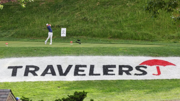 Rory McIlroy plays from the 15th tee during the final round of the 2023 Travelers Championship. 