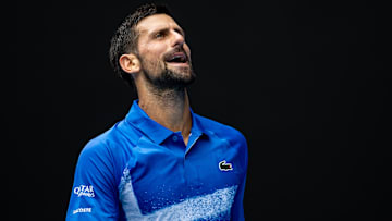 Jan 15, 2025; Melbourne, Victoria, Australia; Novak Djokovic of Serbia gestures during his match against Jaime Faria of Portugal in the second round of the men's singles at the 2025 Australian Open at Melbourne Park. Mandatory Credit: Mike Frey-Imagn Images