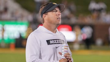 Sep 7, 2024; Columbia, Missouri, USA; Missouri Tigers head coach Eli Drinkwitz watches a replay against the Buffalo Bulls during the second half at Faurot Field at Memorial Stadium. Mandatory Credit: Denny Medley-Imagn Images