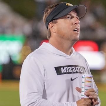 Sep 7, 2024; Columbia, Missouri, USA; Missouri Tigers head coach Eli Drinkwitz watches a replay against the Buffalo Bulls during the second half at Faurot Field at Memorial Stadium. Mandatory Credit: Denny Medley-Imagn Images