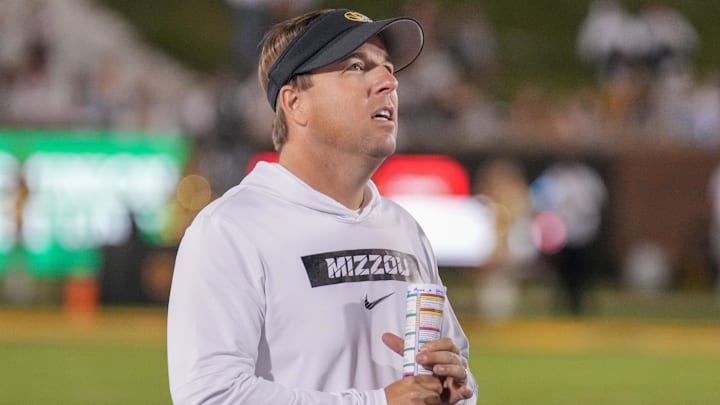 Sep 7, 2024; Columbia, Missouri, USA; Missouri Tigers head coach Eli Drinkwitz watches a replay against the Buffalo Bulls during the second half at Faurot Field at Memorial Stadium. Mandatory Credit: Denny Medley-Imagn Images