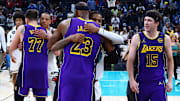 Mar 29, 2025; Memphis, Tennessee, USA; Los Angeles Lakers forward LeBron James (23) and Memphis Grizzlies guard Ja Morant (12) embrace after the game at FedExForum. Mandatory Credit: Petre Thomas-Imagn Images