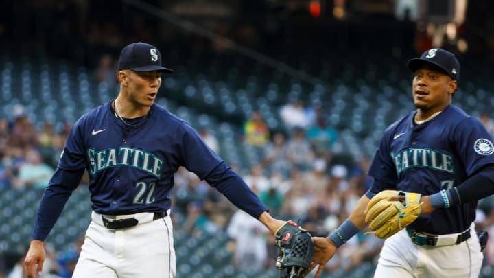 Seattle Mariners starting pitcher Bryan Woo (22, left) reacts following a defensive play by second baseman Jorge Polanco (7) for the final out of the top of the first inning against the Detroit Tigers at T-Mobile Park on Aug 8.