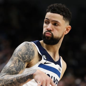 Dec 19, 2022; Minneapolis, Minnesota, USA; Minnesota Timberwolves guard Austin Rivers (25) reacts to his three point shot against the Dallas Mavericks during the fourth quarter at Target Center. Mandatory Credit: Matt Krohn-USA TODAY Sports