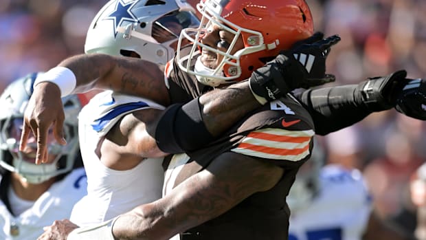 Dallas Cowboys linebacker Micah Parsons (11) hits Cleveland Browns quarterback Deshaun Watson (4)