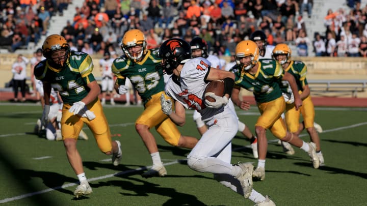 Tanner Heckel (11) runs the ball against Olpe during the Class 1A state football championship Saturday, Nov. 27, 2021, at Fort Hays State University's Lewis Field Stadium. Olpe defeated Inman 35-6.

Class 1a State Football Championship