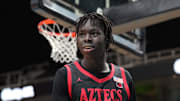 Dec 21, 2024; San Jose, California, USA; San Diego State Aztecs forward Magoon Gwath (0) during the second half against the California Golden Bears at SAP Center. Mandatory Credit: Darren Yamashita-Imagn Images