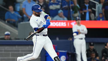 Sep 9, 2025; Toronto, Ontario, CAN; Toronto Blue Jays shortstop Isiah Kiner-Falefa (7) hits a RBI single scoring two runs against the Houston Astros during the ninth inning at Rogers Centre. Mandatory Credit: Nick Turchiaro-Imagn Images