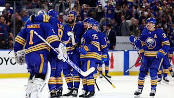 Nov 9, 2024; Buffalo, New York, USA;  The Buffalo Sabres celebrate a shootout win over the Calgary Flames at KeyBank Center. Mandatory Credit: Timothy T. Ludwig-Imagn Images