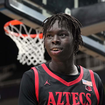Dec 21, 2024; San Jose, California, USA; San Diego State Aztecs forward Magoon Gwath (0) during the second half against the California Golden Bears at SAP Center. Mandatory Credit: Darren Yamashita-Imagn Images